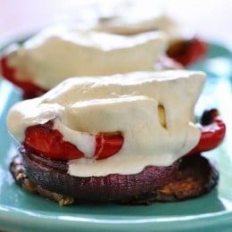 Grilled Vegetable Towers with Mozzarella are layered with grilled, marinated eggplant, zucchini, yellow squash, red onion and bell peppers topped with fresh mozzarella.