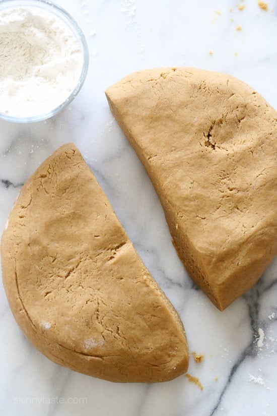 These easy Gingerbread cookies are made with apple sauce to use a fraction of the butter – yet they still have the same great flavor and texture. Perfect for your Holiday baking!