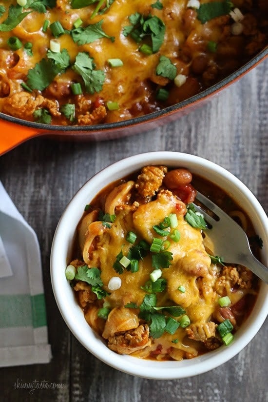 One Pot Cheesy Turkey Taco Chili Mac One Pot Cheesy Turkey Taco Chili Mac recipe is so easy and protein packed! Made with taco seasoning, beans, and pasta shells topped with cheese is a favorite in my home! Bonus points for dirtying only one pot!