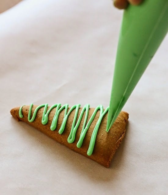 These easy Gingerbread cookies are made with apple sauce to use a fraction of the butter – yet they still have the same great flavor and texture. Perfect for your Holiday baking!