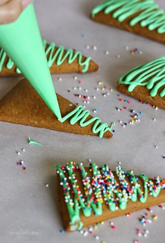 These easy Gingerbread cookies are made with apple sauce to use a fraction of the butter – yet they still have the same great flavor and texture. Perfect for your Holiday baking!