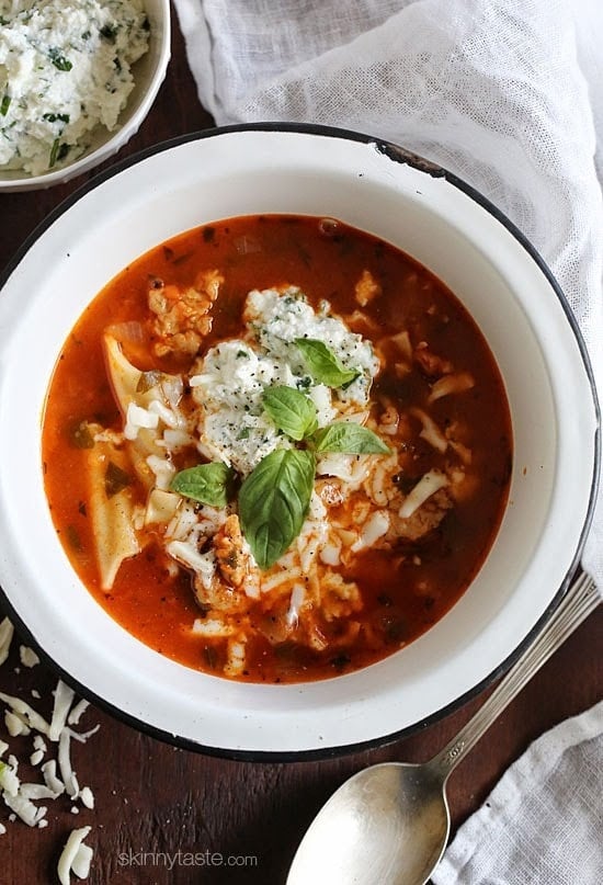 Lasagna Soup has everything you love about lasagna – all in one bowl of soup! Loaded with chicken sausage, lasagna noodles, marinara and cheese. It's easy, filling, hearty and perfect for a cold winter night. Bowl of lasagna soup
