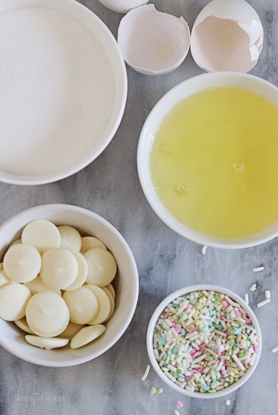 Melt-in-your-mouth meringues dipped in creamy white chocolate and sprinkles, is there anything sweeter?