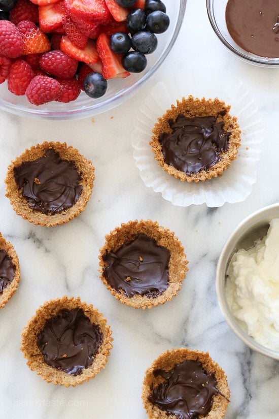 Mixed Berry Tartlet with Dark Chocolate and Vanilla Whipped Cream Mixed Berry Tartlet with Dark Chocolate and Vanilla Whipped Cream – an easy, light summer dessert!