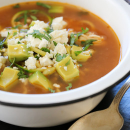 Tender-crisp veggie noodles make a wonderful low-carb pasta replacement in this delicious, Latin inspired Chipotle Chicken Zucchini "fideo" soup combined with bright fresh cilantro, creamy avocado and some crumbled queso fresco on top.