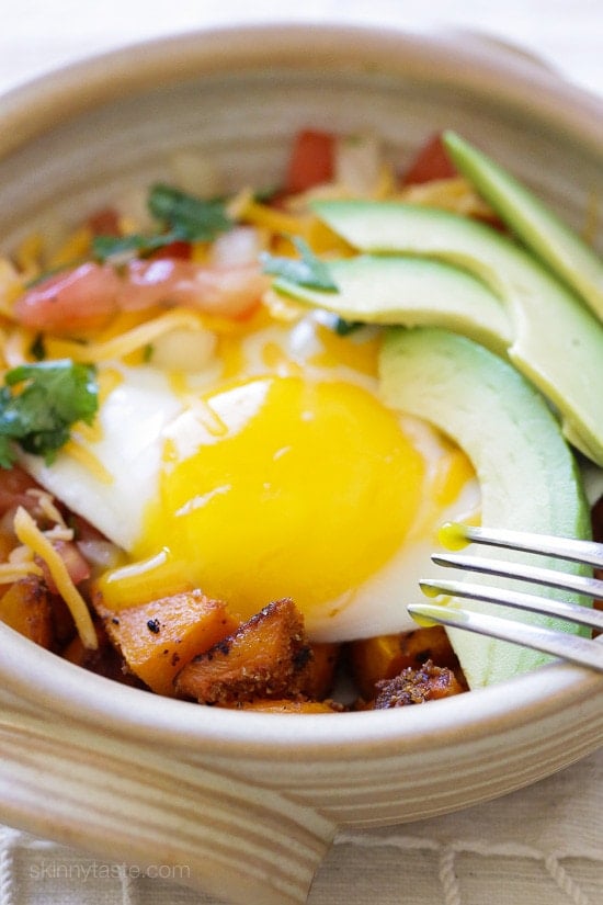 Breakfast Burrito Bowl with Spiced Butternut Squash A Mexican-inspired breakfast burrito bowl with roasted butternut squash, pico de gallo, egg and sliced avocado.