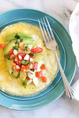 I'm pretty obsessed with making open-faced omelets and make them all the time topped with whatever I have on hand (you may remember this tomato and feta omelet). Since I always have avocados on hand, and I had some leftover pico de gallo from this recipe, I've been whipping this up all week!