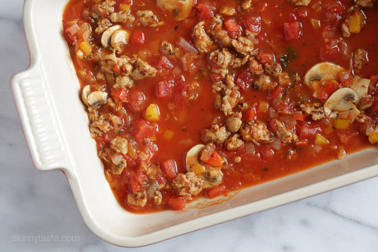 Chicken sausage, bell peppers, onions and mushrooms simmered in a marinara sauce then baked in the casserole with whole wheat macaroni topped with mozzarella.