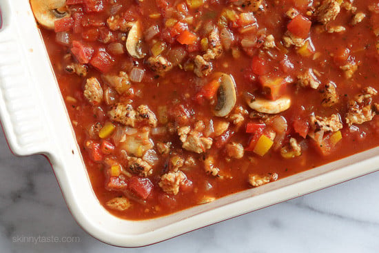 Chicken sausage, bell peppers, onions and mushrooms simmered in a marinara sauce then baked in the casserole with whole wheat macaroni topped with mozzarella.
