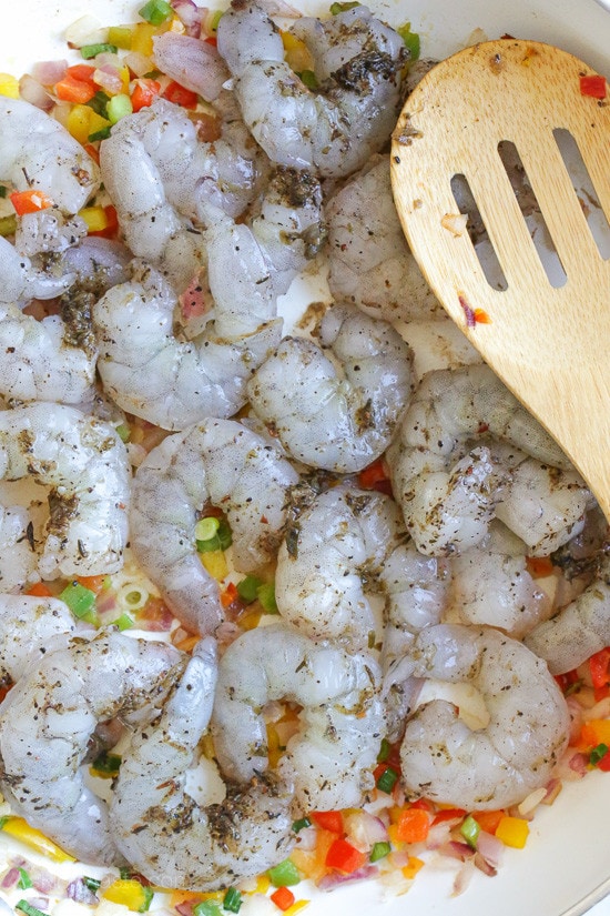 Jamaican Coconut Shrimp Stew Quick Jamaican shrimp recipe. Raw shrimp in a skillet.