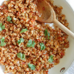 This Mexican inspired dish of Cauliflower Rice uses finely chopped cauliflower, which makes a fantastic low-carb, grain-free stand in for rice.