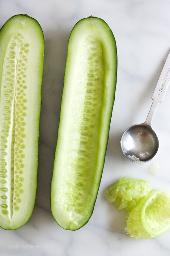 Cucumbers with the seeds scooped out and filled with hummus, avocado, tomatoes, onion and sprouts. So refreshing, healthy and light!