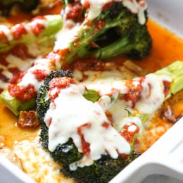 I gave one of my favorite veggies – roasted broccoli – the parmesan treatment (topped with with marinara and melted mozzarella)! If it works for eggplant, why not broccoli!
