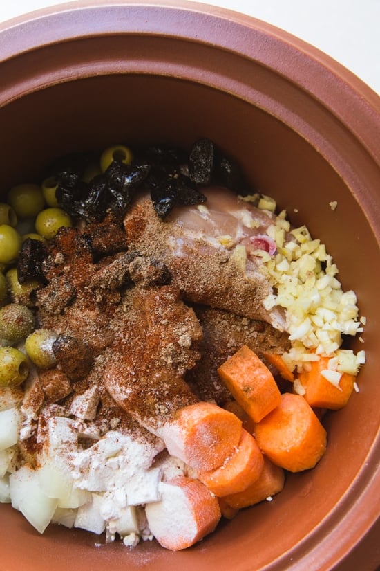 Chicken, prunes, olives, carrots, onions, garlic and ginger are slow-cooked with Moroccan spices to create a flavorful and fragrant dish that you’ll want to make again and again. Serve it over whole-wheat couscous (or cauliflower rice for a low-carb option) with lemon wedges, fresh cilantro, or some chopped pistachios or almonds for a complete meal.