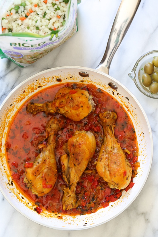 Spanish chicken and rice, a dish I grew up eating, is pure comfort food to me. This low-carb version swaps the rice for veggies, which means larger portions with 85% less calories than rice!