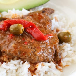 Braised Cubed Steak with Peppers, Onions and Olives is a flavorful, budget-friendly and family friendly dish you can make in the Instant Pot, Slow Cooker or in a pot on the stove.