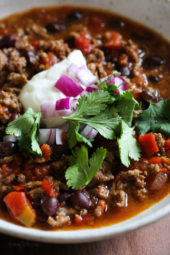 I love this quick and easy beef chili made with black beans, tomatoes, homemade chili spices and beer. This chili pleases all the palates in my house – not to too spicy (although you can kick it up if you wish), loaded with flavor, and ready in less than 30 minutes.