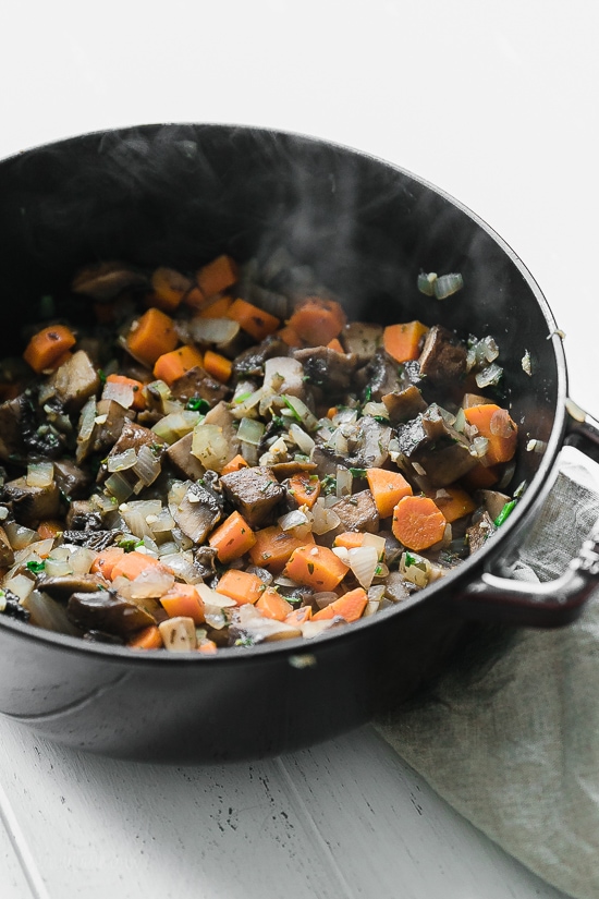 This fast and fresh vegetarian Shepherd’s Pie made with Portobello mushroom, carrots, peas, corn, and onions, all topped with leftover Skinny Garlic Mashed Potatoes, is the perfect after-Holiday fix.