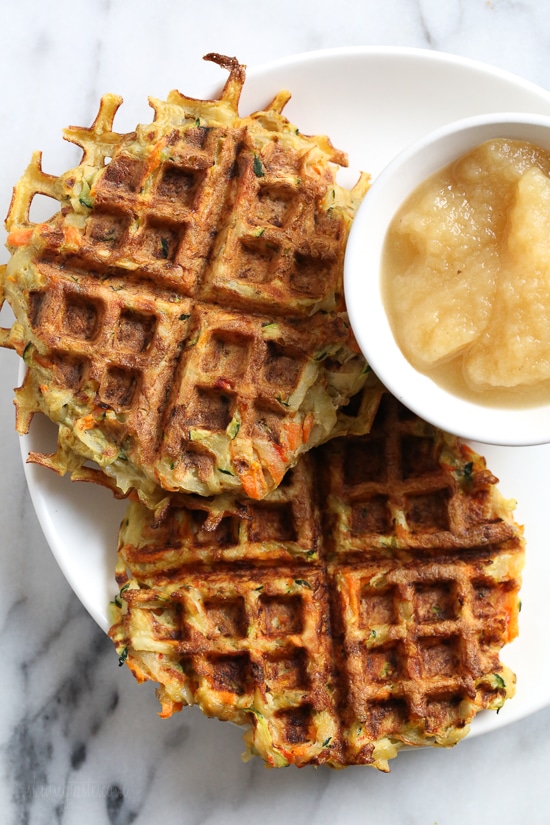 These veggie-packed latkes, are not your traditional latkes, they’re made with shredded potatoes, carrots, zucchini and bell pepper, and they are cooked in a waffle iron so there’s no need to fry! Top them with sour cream, lox and capers or with apple sauce on the side.