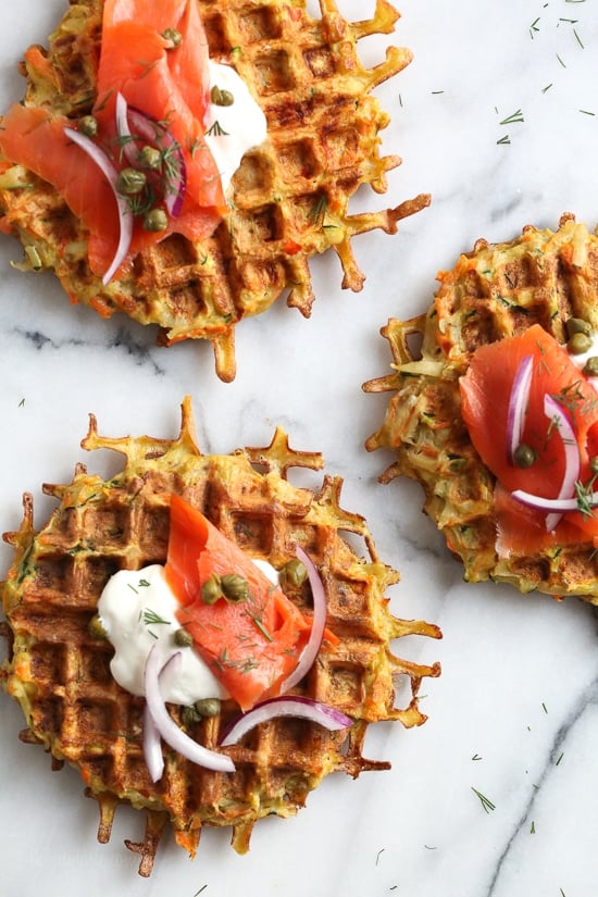 These veggie-packed latkes, are not your traditional latkes, they’re made with shredded potatoes, carrots, zucchini and bell pepper, and they are cooked in a waffle iron so there’s no need to fry! Top them with sour cream, lox and capers or with apple sauce on the side.