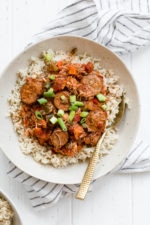 This New Orleans-inspired slow-cooker dish with chicken and Andouille sausage simmered in a rich tomato broth, is perfect to make for Fat Tuesday!