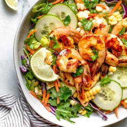 This refreshing Thai-style salad with greens, herbs, veggies and shrimp, all tossed in a delicious cashew dressing, is the perfect one-dish summer dinner.