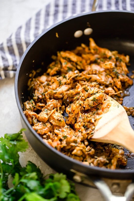 These Zucchini Chicken Enchilada Roll Ups are filled seasoned shredded chicken, topped with enchilada sauce and cheese. Delicious, and perfect for Keto, gluten-free or low-carb diets.