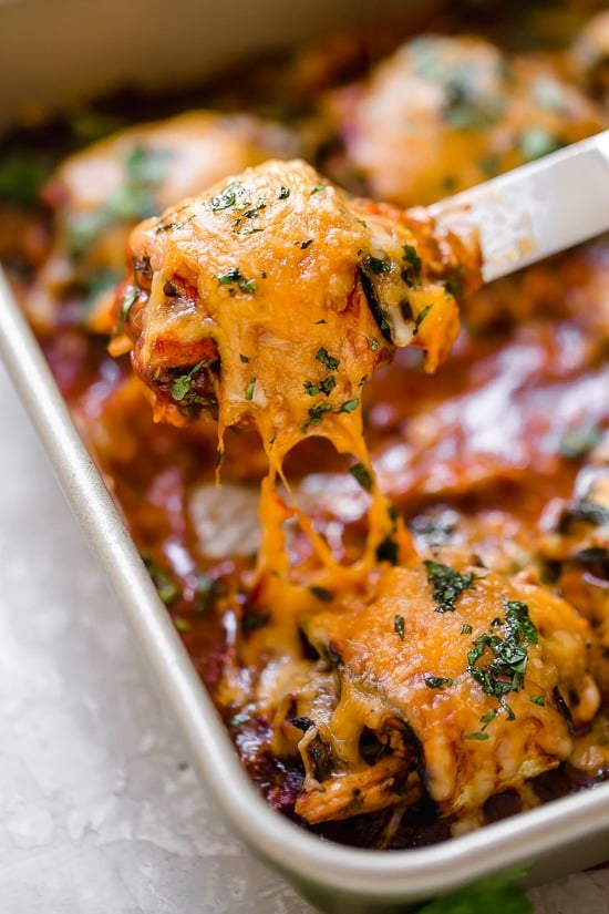 These Low-Carb Chicken Enchilada Roll Ups are made with zucchini in place of tortillas! Delicious, and perfect for Keto, gluten-free or low-carb diets.