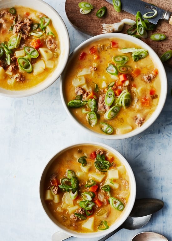 This Cheeseburger Soup recipe is a rich and cheesy bowl of comfort food made on the lighter side. It's quick and easy, loaded with turkey and potatoes in every bite!