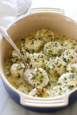 These quick and easy baked sea scallops are topped with panko and Parmesan in a simple lemon-butter sauce.