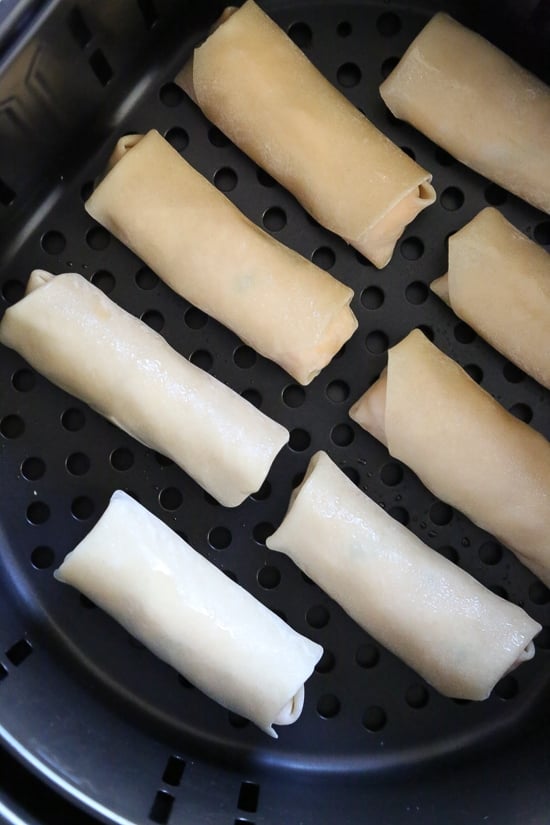 These Buffalo Chicken Egg Rolls, filled with shredded boneless chicken breast, hot sauce and blue cheese make the perfect appetizer! Bake them in the oven or air fryer!