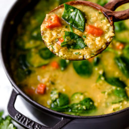 Red Lentil Soup with Spinach is a delicious, Middle Eastern inspired Lentil Soup, made with red lentils, turmeric, spinach, carrots and lemon. It's golden in color, and very easy to make and leftovers are freezer-friendly.