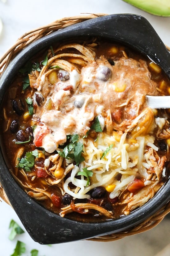 Chicken Taco Chili, made with chicken, beans, corn and tomatoes seasoned with taco seasoning is one of my most popular slow cooker recipes, which I just remade for Instant Pot after several requests! This recipe couldn’t be easier, made with ingredients you probably already have in your pantry.
