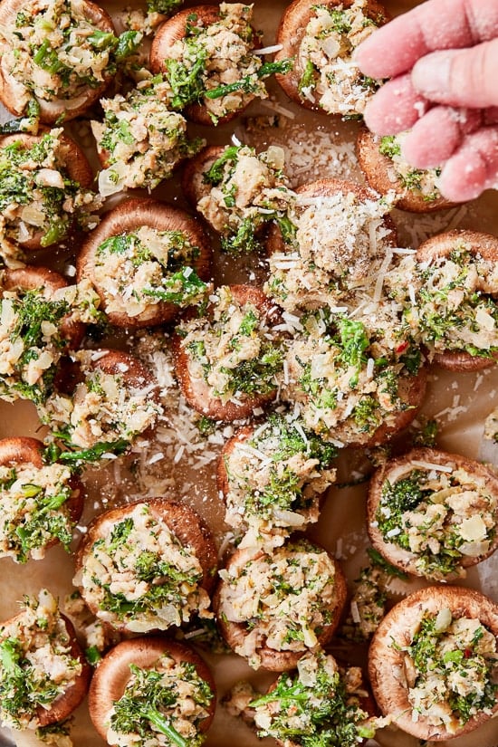 I'm OBSESSED with these Italian stuffed mushrooms filled with broccoli rabe and sausage, the perfect festive holiday appetizer!