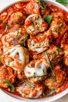 Cheesy Turkey Meatballs covered in sauce and cheese, made all in one skillet, serve this with a green salad and a little bread on the side for dipping!