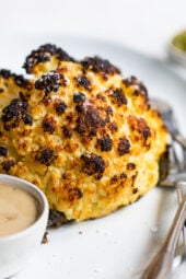 This simple, Whole Roasted Baby Cauliflower is perfectly charred on the outside and tender in the middle. Made with just four ingredients – salted water, extra-virgin olive oil, coarse sea salt—and cauliflower.