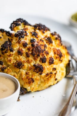 This simple, Whole Roasted Baby Cauliflower is perfectly charred on the outside and tender in the middle. Made with just four ingredients – salted water, extra-virgin olive oil, coarse sea salt—and cauliflower.