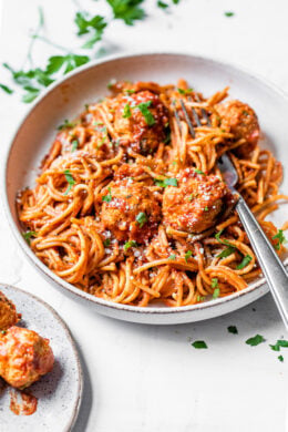 Bowl of Instant Pot spaghetti and turkey meatballs with fork.