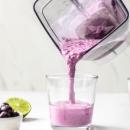 Tropical Lassi is a healthy, Indian yogurt drink blended with frozen mango, tart blueberries and spices.