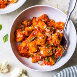 Cauliflower Gnocchi in a bowl with a fork.