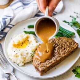 Meatloaf and Gravy with mashed potatoes and green beans.