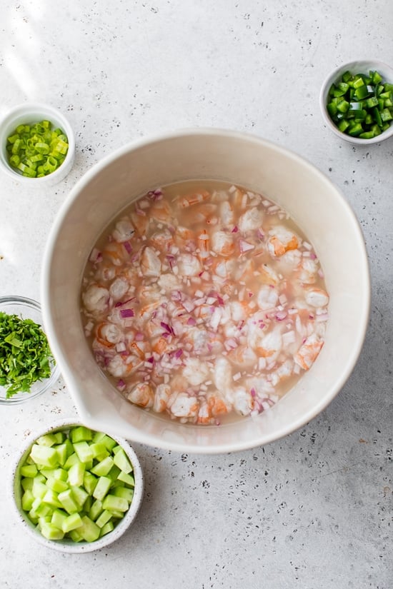 Marinate shrimp in lime juice.
