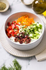 Cottage Cheese with cucumbers, tomatoes, bell peppers and olives