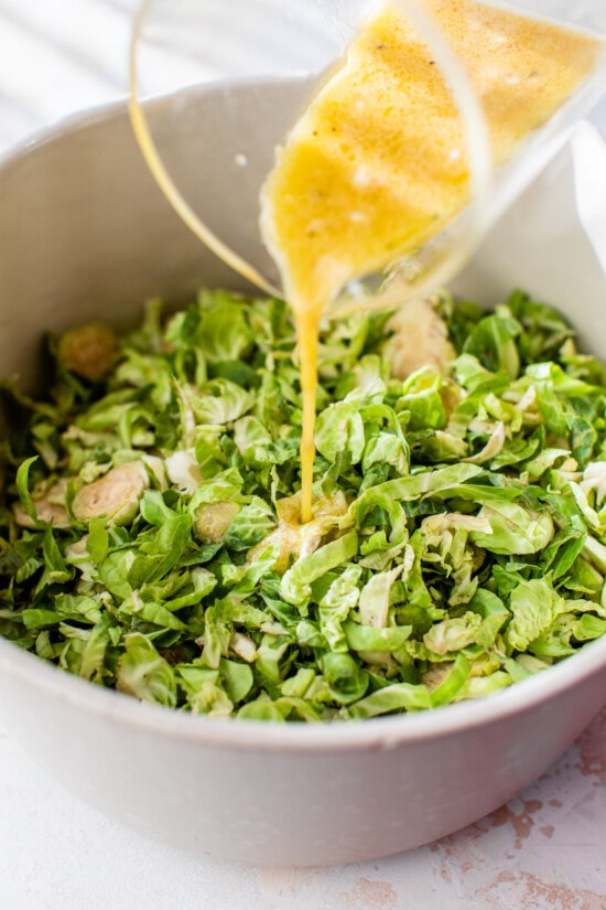 adding dressing to