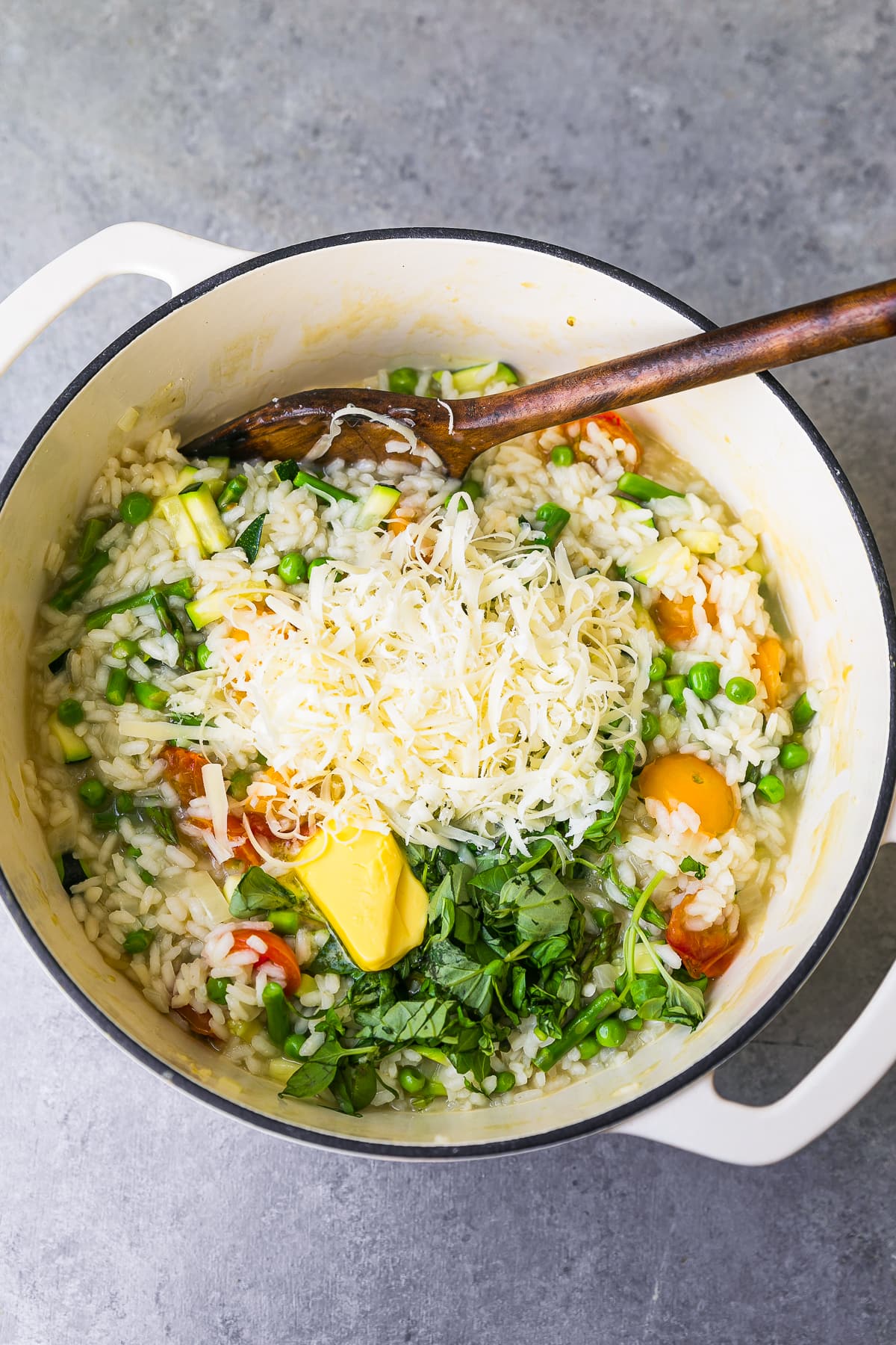 add parmesan cheese and butter to risotto at the end