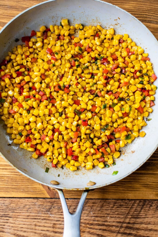 crab and bell peppers in a skillet