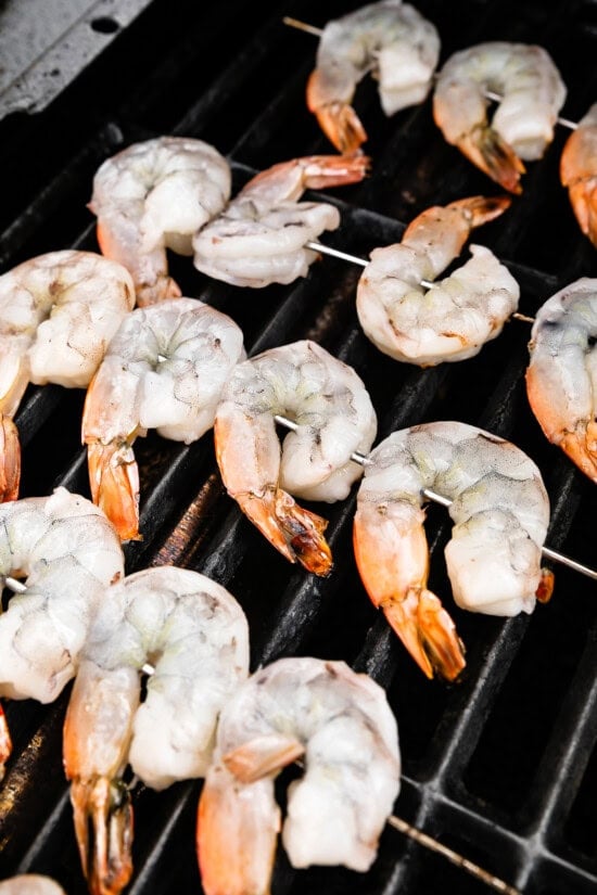Place on skewers and preheat the grill.