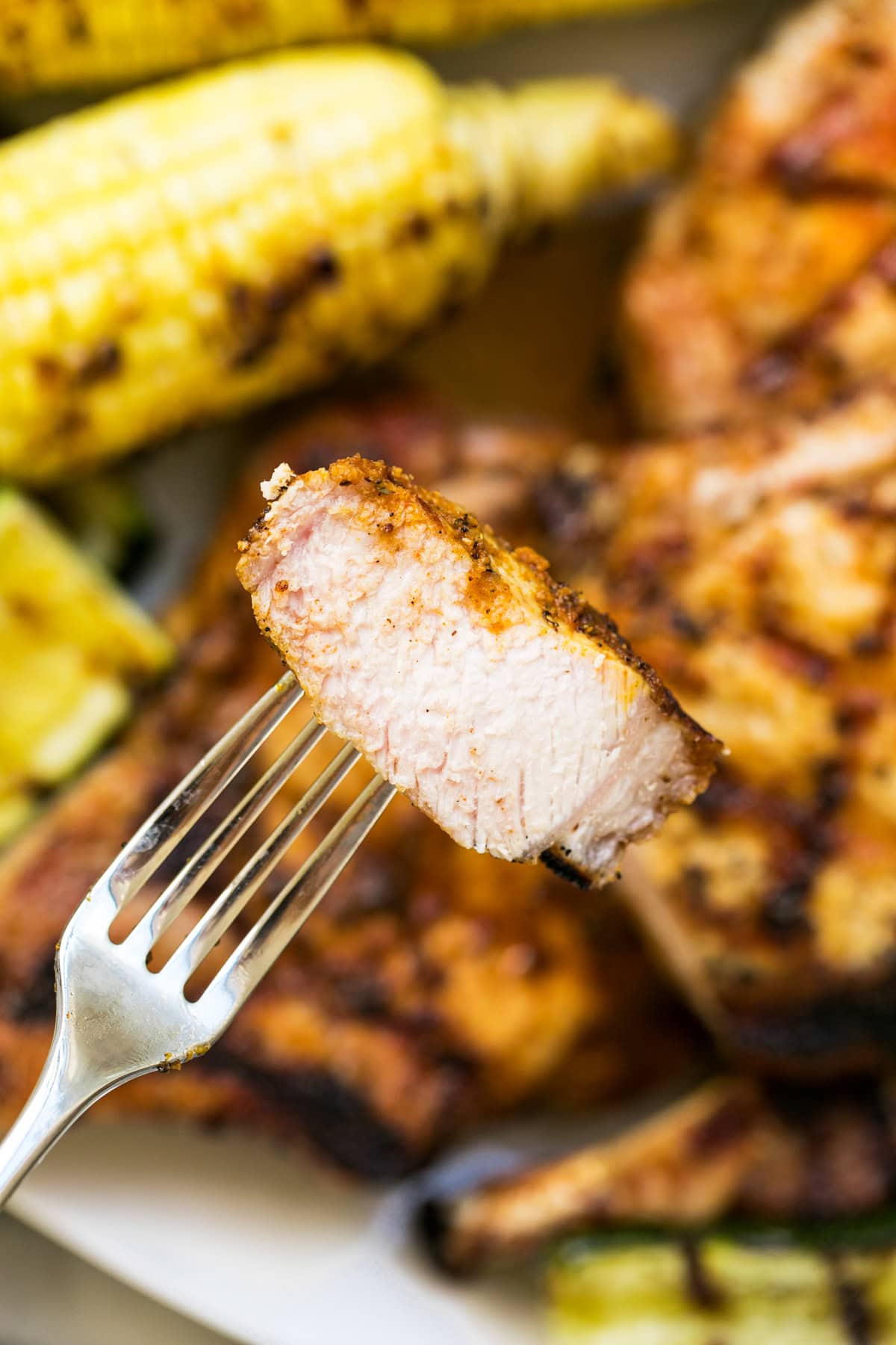Grilled Pork Chop on a fork